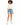 A model with curly hair wears a cropped beige top paired with distressed denim shorts and white sneakers.