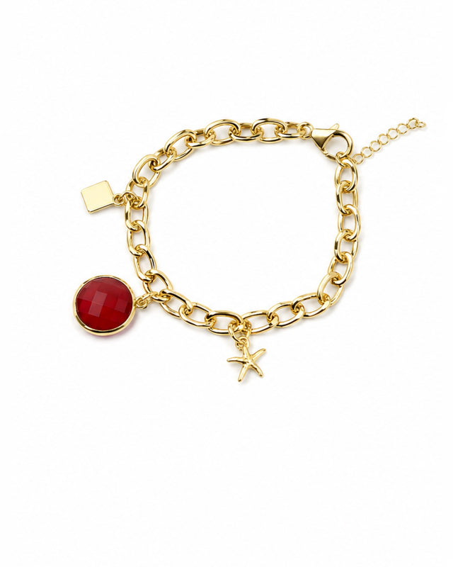Gold chain bracelet featuring a round red stone and a starfish charm, for adding a pop of color.