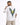 A man wearing a white oversized t-shirt featuring a colorful bird wing graphic on the back.