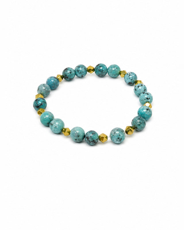 Turquoise and speckled blue beads interspersed with golden accents create a vibrant bracelet design.