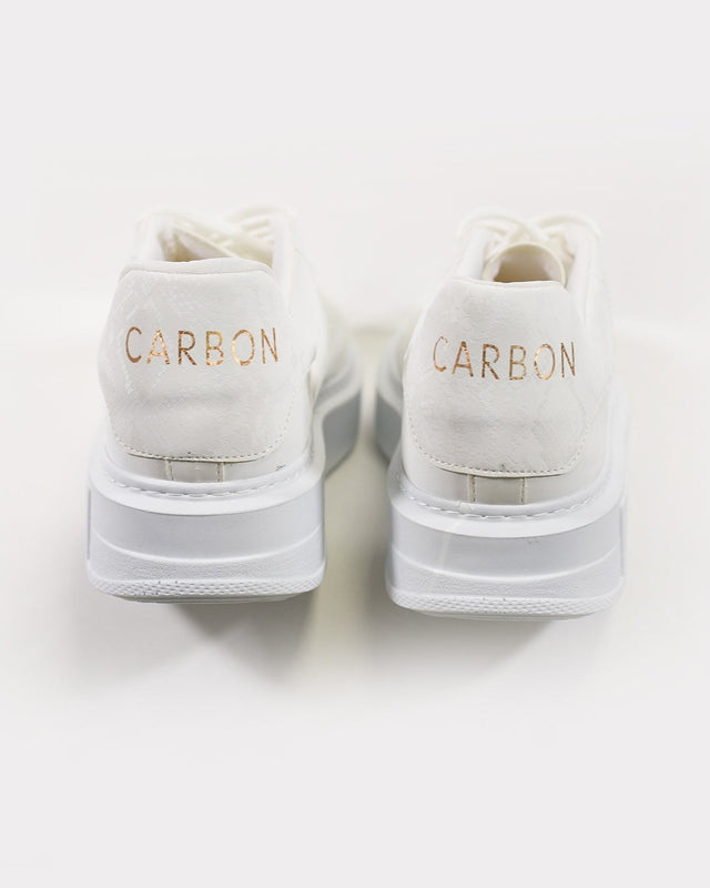 Rear view of Queen Platform Sneakers in white with gold Carbon logo on heel and chunky streetwear rubber soles.