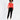 Model in a red off-the-shoulder long sleeve top paired with black joggers and white high-top sneakers.