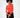 Model wearing a bright orange-red ribbed long sleeve off-the-shoulder top with black pants.