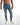 Close-up of Jairo blue washed skinny jeans for men featuring biker panels, distressed details, and a modern streetwear fit.