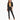 A model poses in a cropped black blazer over a yellow bikini, paired with fitted black pants featuring slits.