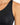 Close-up of a black activewear top featuring a sleek design and thin straps, ideal for workouts.