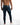 Rear view of Carbon Jaxx blue washed denim for men, featuring white paint splatter and branded waist patch.