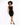 A woman with curly hair poses in a fitted black dress and high heels against a plain white background.