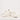 A pair of glossy white sneakers with lace-up design and subtle branding on the side.