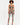 Colorful two-piece set featuring a cropped top with adjustable ties and high-waisted leggings adorned with abstract p...