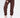 Close-up of JOLENE burgundy two-piece jogger pants set with elastic cuffs and white sneakers for women's streetwear.