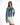 Jolie oversized blue washed denim jacket with distressed frayed hems worn over a white dress for a streetwear aesthetic.