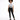 A model stands confidently in a graphic tee and black skinny jeans, paired with stylish black sneakers.