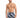 A man stands confidently in colorful swim trunks featuring a modern abstract pattern, showcasing a relaxed summer vibe.