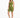 A model poses in a one-shoulder olive green crop top paired with matching bike shorts and white sneakers.