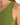 Close-up of a green sleeveless top, showcasing the smooth fabric around the shoulder area.