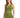 A model poses in a fitted olive green crop top and matching high-waisted shorts, showcasing a stylish athletic look.
