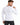A man wearing a fitted white long-sleeve shirt, showcasing a minimalist design and casual style.