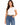A woman wearing a fitted white t-shirt and high-waisted blue jeans, accessorized with a brown belt.