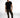 A man stands confidently in a fitted black t-shirt and olive cargo pants, paired with stylish sneakers.