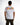 A person wearing a white t-shirt with colorful splatter art and the word "CHOICES" printed on the back.