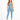 A woman stands confidently in a light blue one-shoulder crop top and matching leggings, paired with white sneakers.