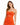 A woman smiles while wearing a fitted orange dress with thin straps and a cutout detail at the waist.