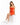 A woman sits on a white cube wearing a fitted orange dress with a cutout detail and white sneakers.
