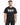 A man wearing a black graphic t-shirt featuring colorful designs and a positive message about kindness.