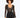 A model poses in a sheer black long-sleeve top with a deep neckline and high-waisted black shorts.