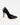 Sleek black pointed toe heels with a high stiletto pump design on a white background.