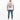 A man stands wearing a white graphic t-shirt featuring a lion design, paired with distressed blue jeans and white sne...