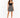 A woman stands confidently in a black crop top and a patterned mini skirt, paired with stylish high heels.