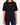 A model wearing a loose-fitting black t-shirt with white embroidered text on the chest, paired with distressed jeans.