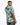A man wearing a short-sleeve shirt with a teal and cream abstract pattern, viewed from the back.