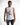 A man wearing a sleeveless white shirt with graphic text and images, paired with dark, patterned pants.