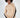 Model in Lilith beige knit sweater with black sleeve stripes and shoulder cut-outs for a fall aesthetic.