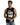 A man wearing a sleeveless black top with a graphic design and distressed denim shorts, posing thoughtfully.