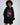 Model in an oversized black hoodie featuring a pink lips graphic, monogram print, and ruched sleeves.