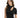 A woman with long, wavy hair wears a fitted black top featuring a mock neck and a stylish cutout.