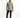 A man wearing a sleeveless light gray top with colorful text, paired with black jeans and white sneakers.