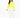 A model wearing a bright neon yellow turtleneck top paired with white joggers and white sneakers.