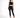 A model poses in a black lace crop top and fitted black jeans, paired with strappy black heels.