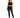 A model poses in a black crochet crop top and fitted black jeans, complemented by strappy black heels.