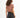 Back view of woman in Lucy Side String Brown Crop Top and black denim shorts, aesthetic streetwear style.