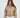 Thea Beige puffer coat for women with high neck and silver ring zipper pull worn by model.