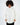 Model wearing the Mabel Cream Knit Sweater, a white oversized turtleneck with dropped shoulders and ribbed cuffs.