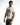 A man wearing a white t-shirt featuring a colorful pixelated robot graphic, paired with distressed jeans.