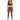 A woman stands confidently in fitted brown leggings paired with a dark sports bra and stylish sneakers.