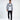 Man wearing Tom Grey Washed Denim Shirt by Carbon over a white graphic tee and black pants.